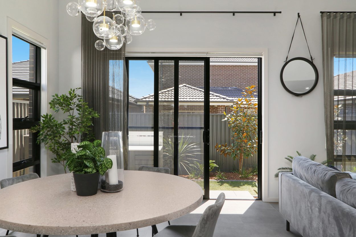 Ascend stacking door in Black Matt, Meridian
