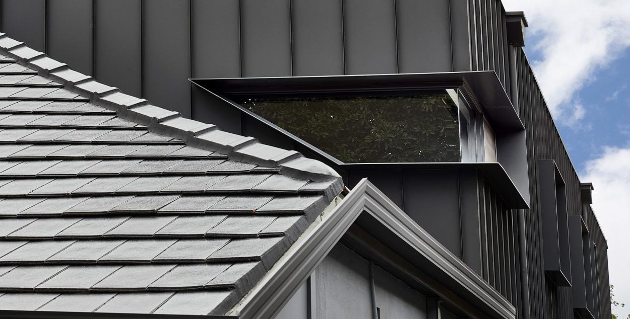 Kingsford project: Paragon 90 degree corner custom shape window in Monument Matt