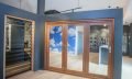 Natura timber bi-fold door and louvre window, Wideline Rosebery Showroom