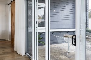 Horizon stacking door and stacking screens in Pearl White