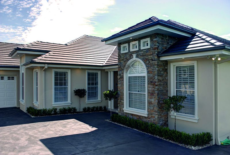 Horizon awning and arch window with glazing bars in Pearl White