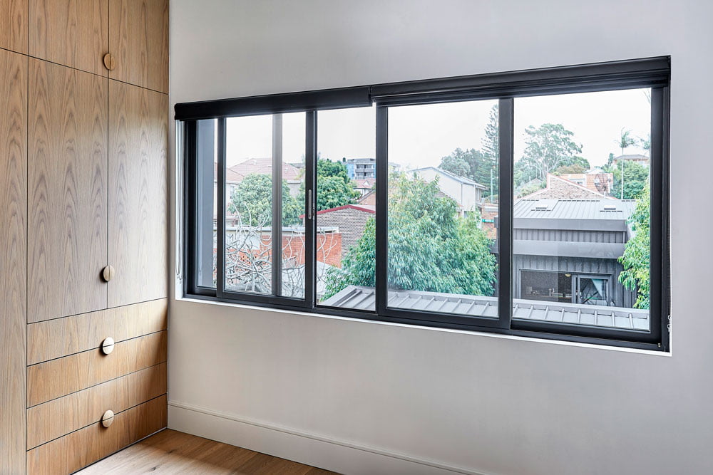 Paragon sliding window in Monument Matt with silver hardware