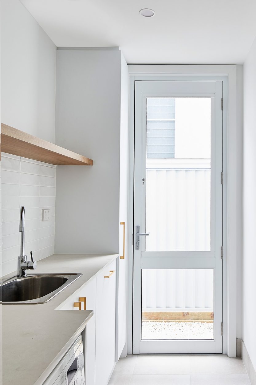 Paragon laundry door with sashless window insert in Pearl White