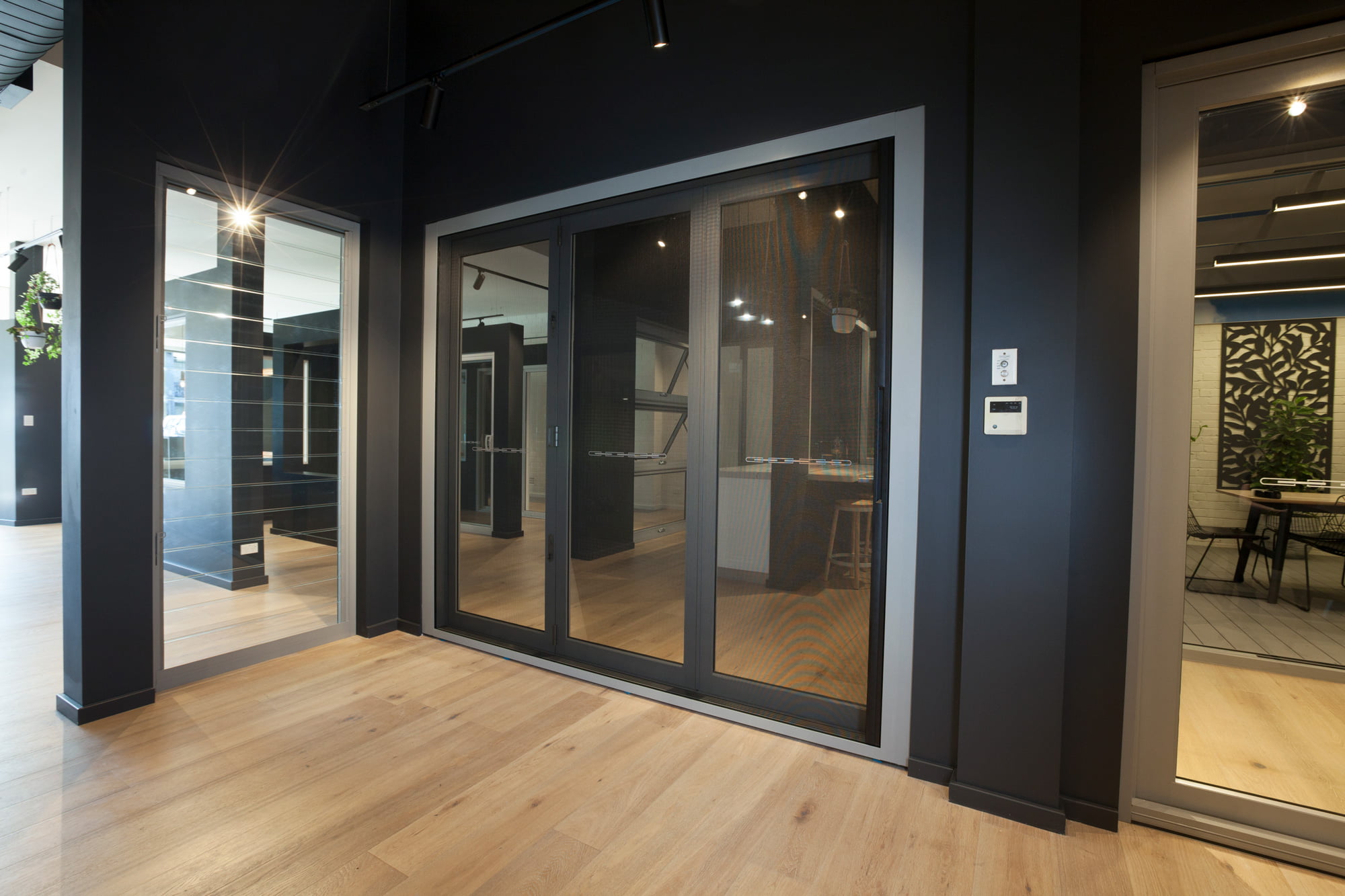 Paragon bi-fold door in Precious Silver with Centor retractable screen, Wideline Rosebery Showroom