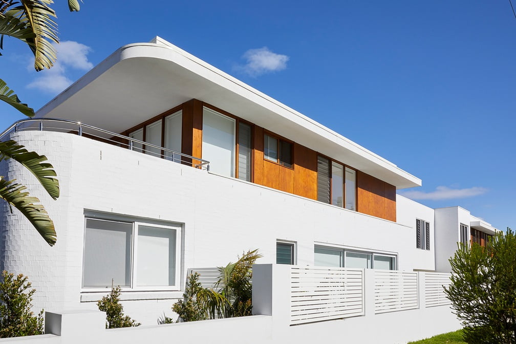 white home with wooden cladding