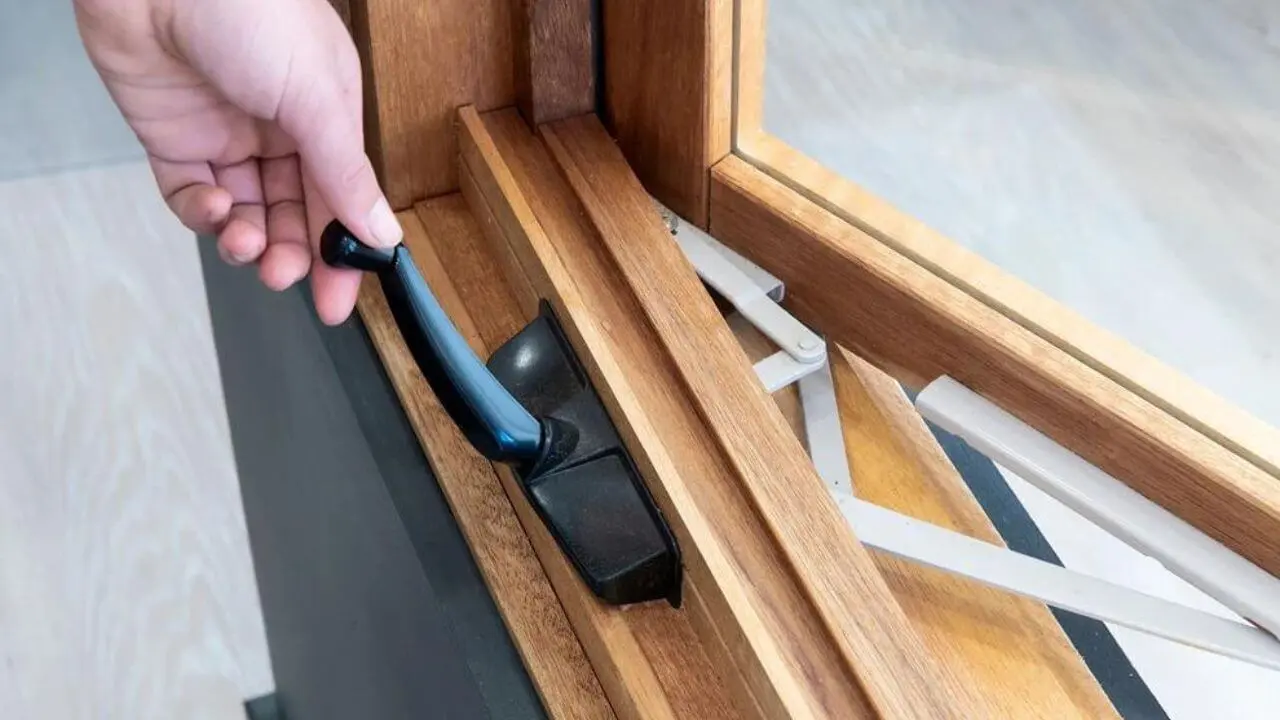 opening a timber casement window